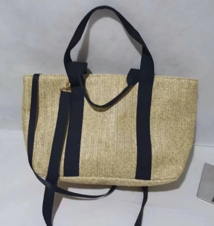 Duurzame strandhandtas van beige stro