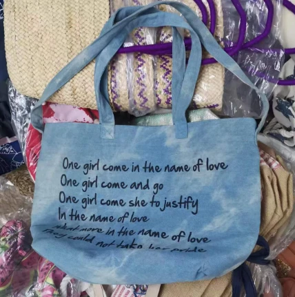 Damestas van denimstof met twee handvatten